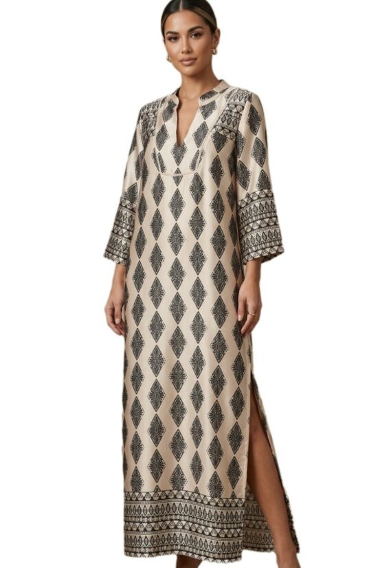Beige maxi dress with navy diamond geometric print V neck 34 sleeves with decorative cuffs and a side slit